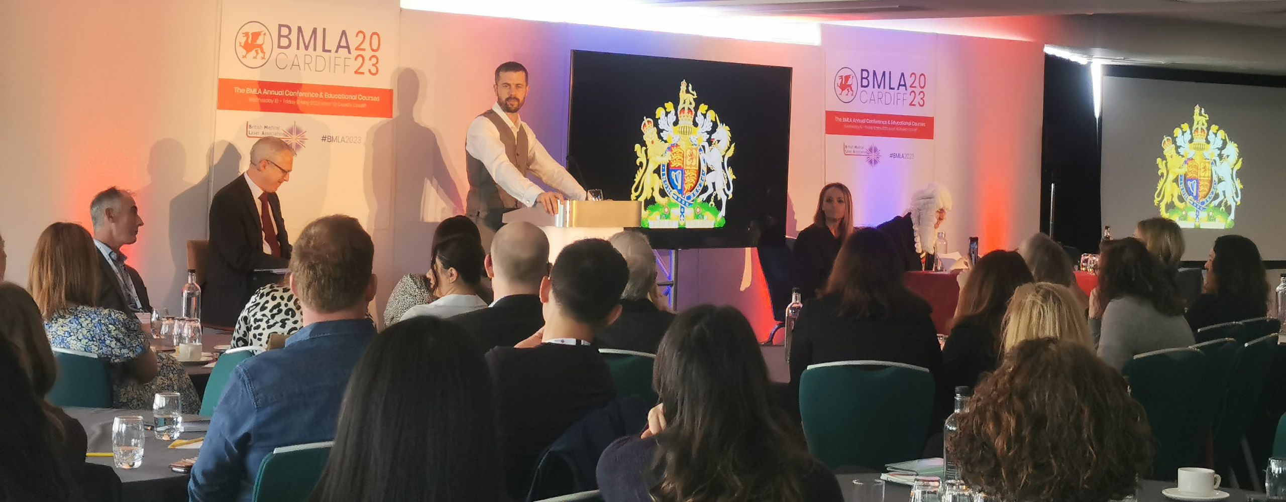 Opening Doors and Venues conference gala dinner set up with glasses and table decorations